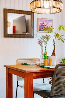 a vase of flowers sitting on a table