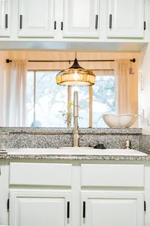 a living room with a couch and a table