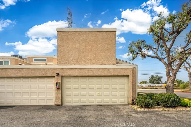 a front view of a house with a garage