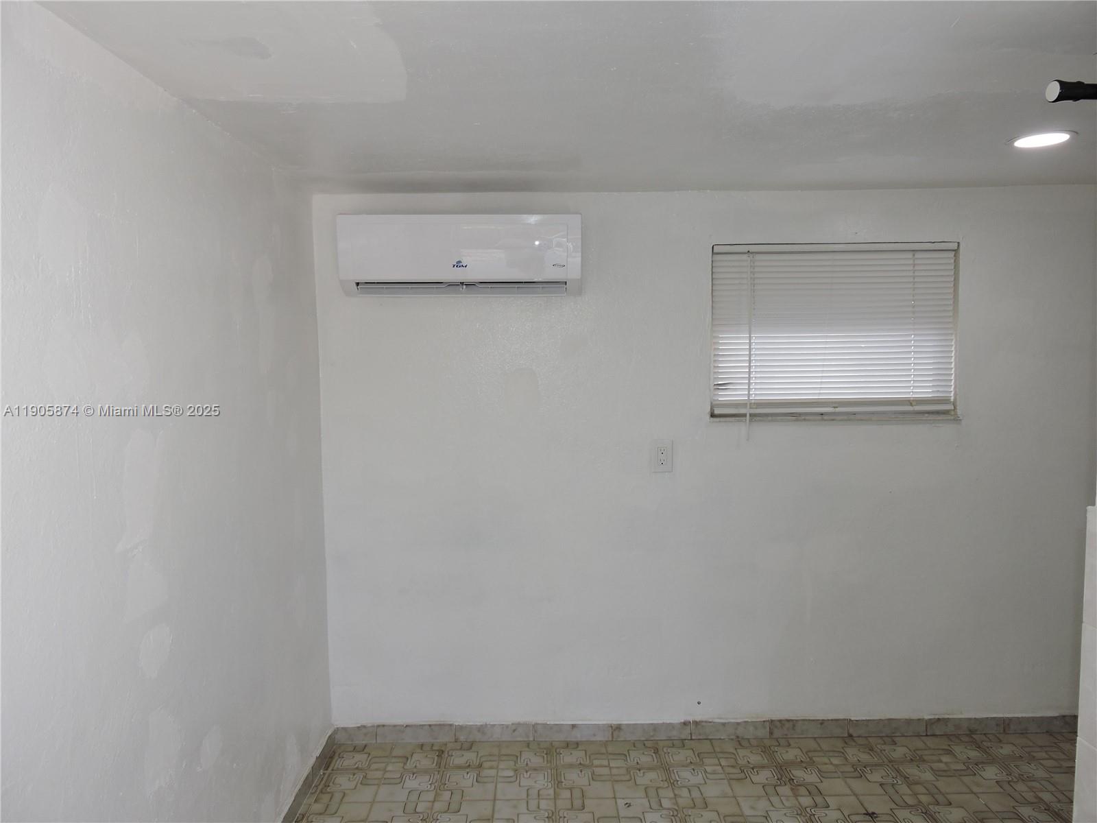 5451 West 10th Avenue, Unit 5 Hialeah, FL 33012 - Photo 17 of 26 a view of an empty room