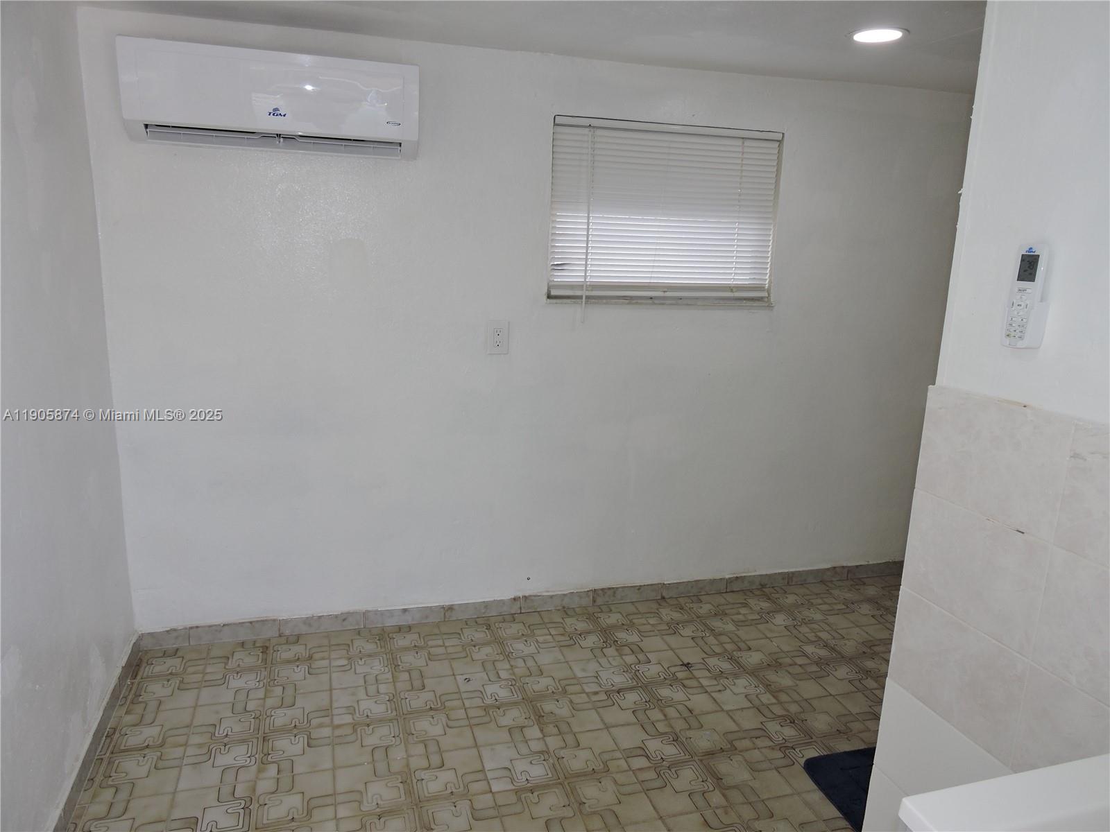 5451 West 10th Avenue, Unit 5 Hialeah, FL 33012 - Photo 18 of 26 a view of an empty room