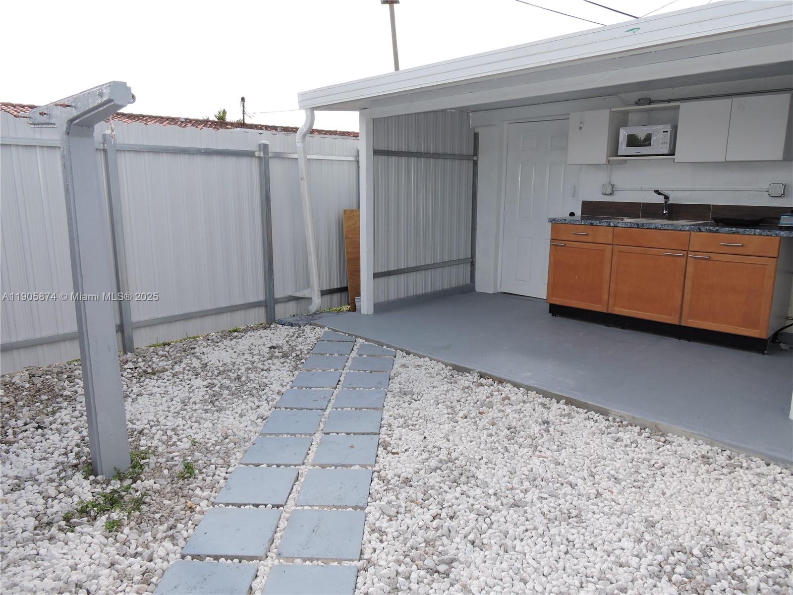 5451 West 10th Avenue, Unit 5 Hialeah, FL 33012 - Photo 22 of 26 a view of a storage & utility room