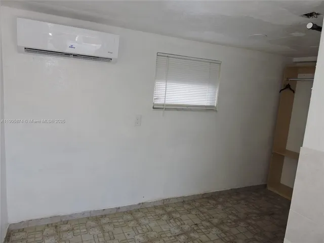 a view of a small space with window