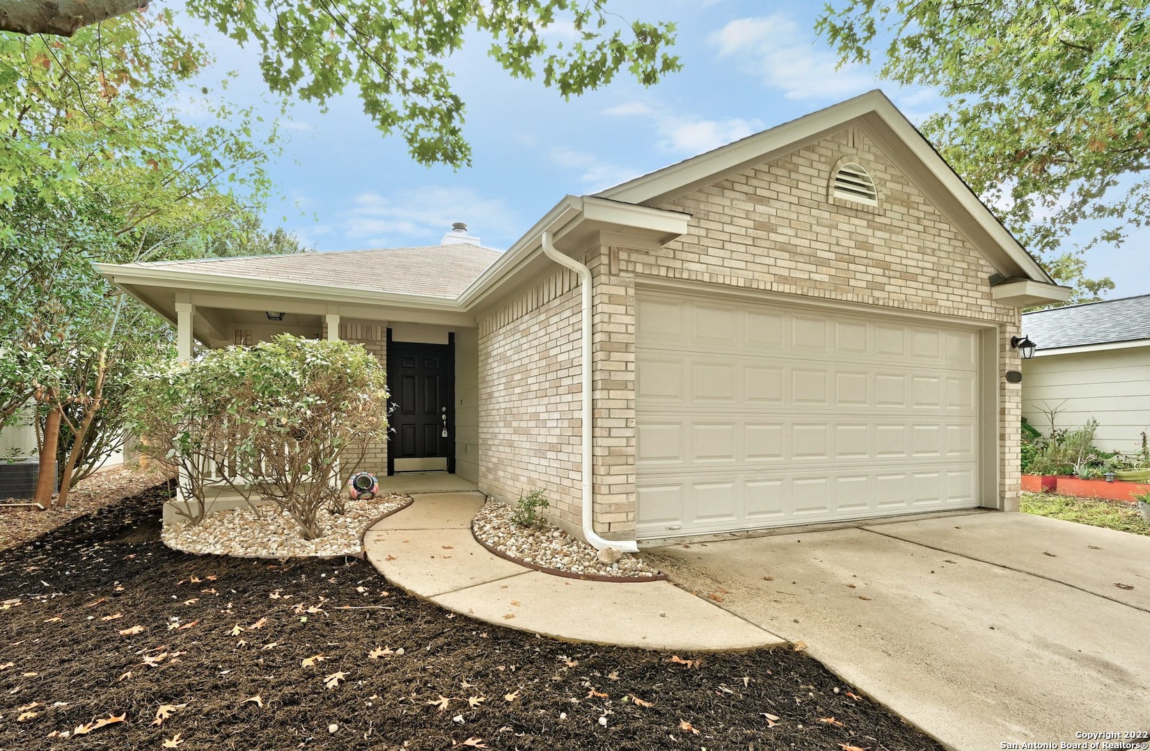 1131 Emmitt Run Austin, TX 78721 - Photo 1 of 1 a front view of a house with a yard