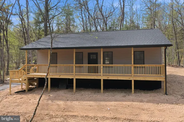 a view of balcony with an outdoor and seating