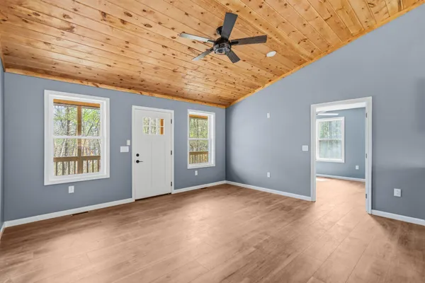 an empty room with windows