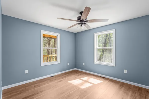 a view of an empty room and window