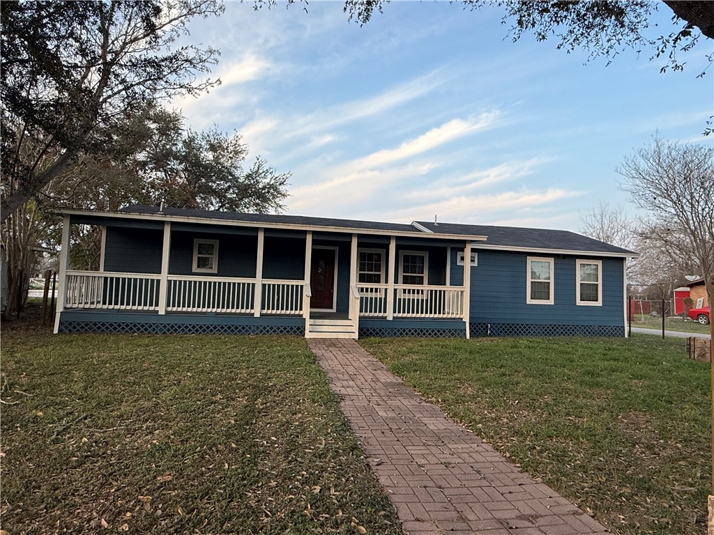 917 Corazan Street Alice, TX 78332 - Photo 2 of 37 a view of a house with a yard