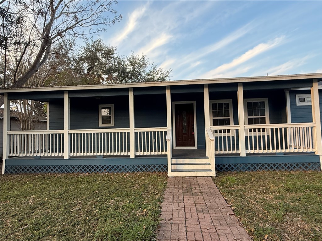 917 Corazan Street Alice, TX 78332 - Photo 3 of 37 a porch with a bench