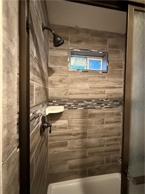 917 Corazan Street Alice, TX 78332 - Photo 35 of 37 a bathroom with a shower