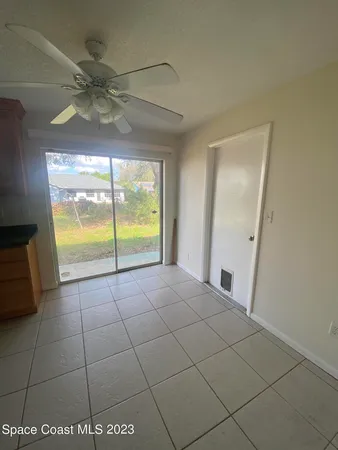 a view of an empty room and window