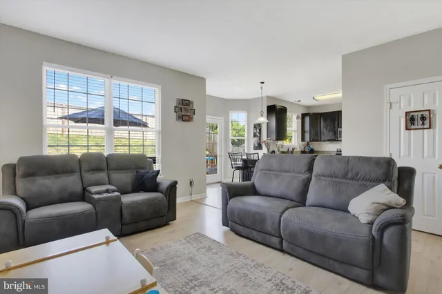 a living room with furniture and a couch