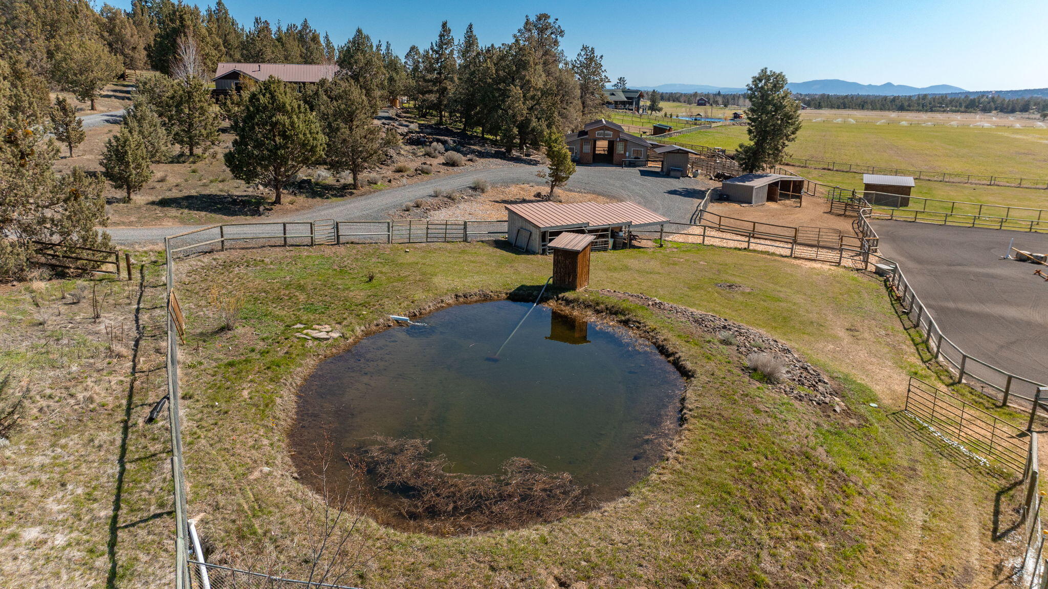 19395 Innes Market Road Bend, OR 97703 - Photo 69 of 75 a view of a swimming pool with a yard
