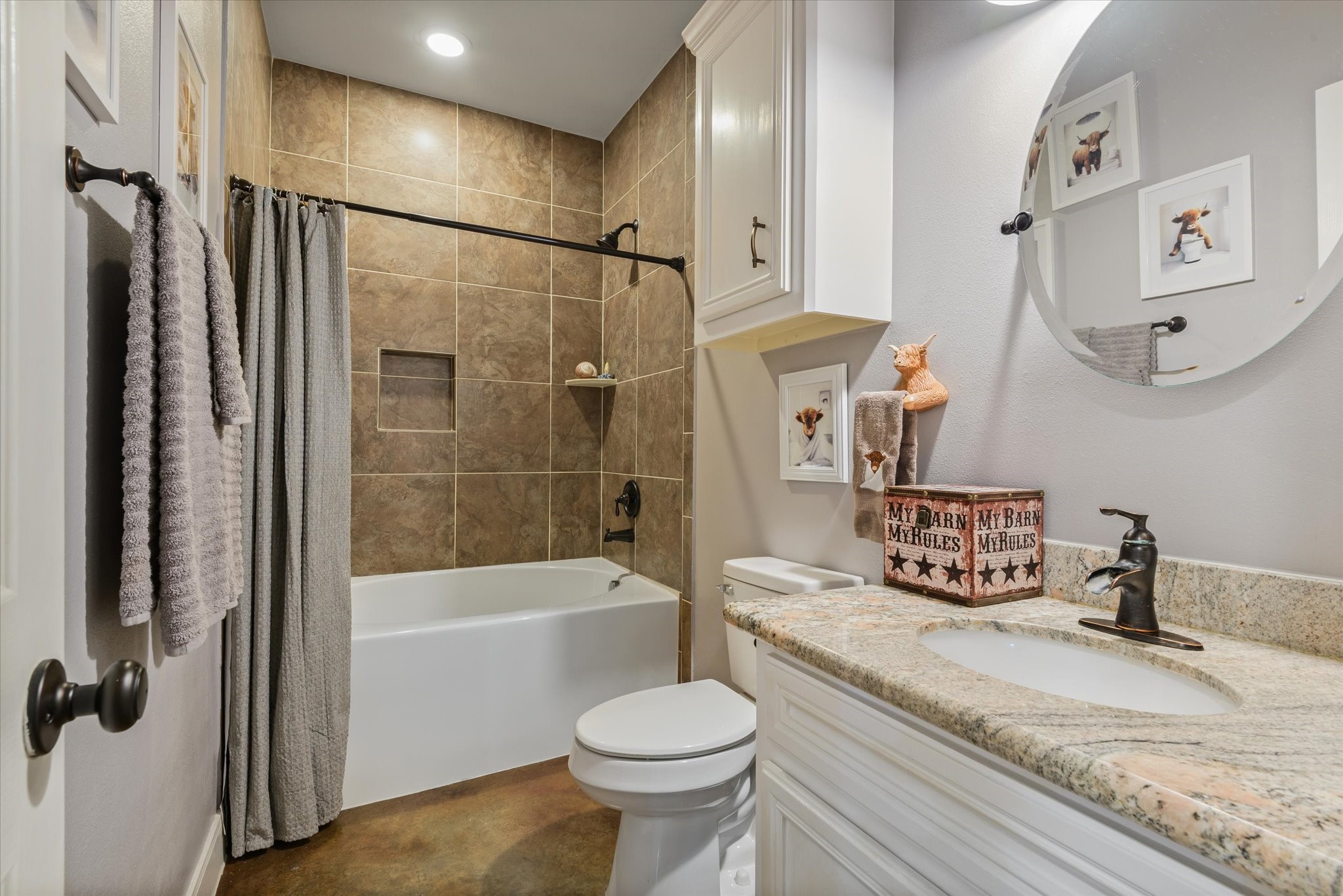 11578 28th Street Santa Fe, TX 77510 - Photo 24 of 46 a bathroom with a granite countertop sink toilet and shower