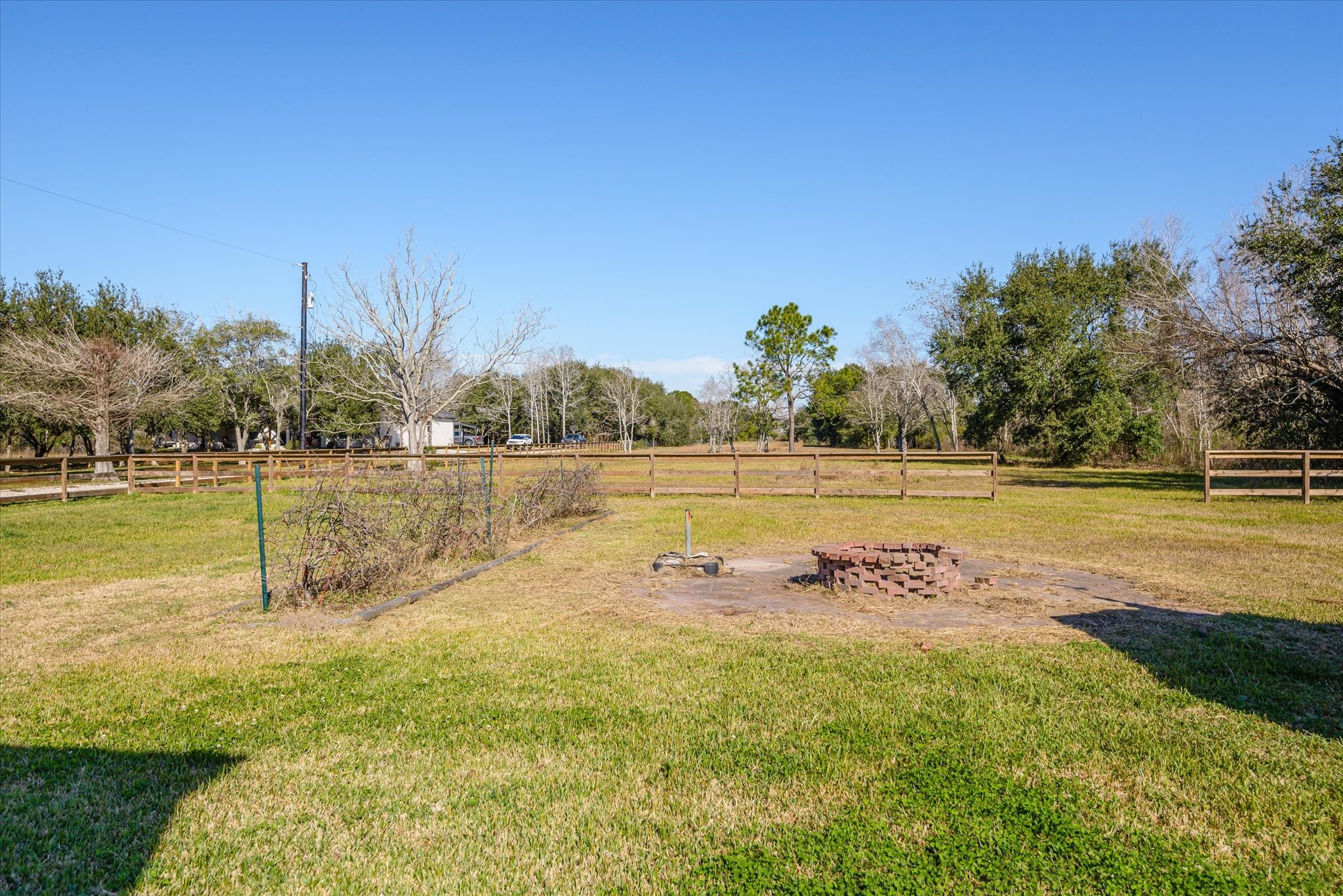 11578 28th Street Santa Fe, TX 77510 - Photo 31 of 46 a view of a lake with houses in the back
