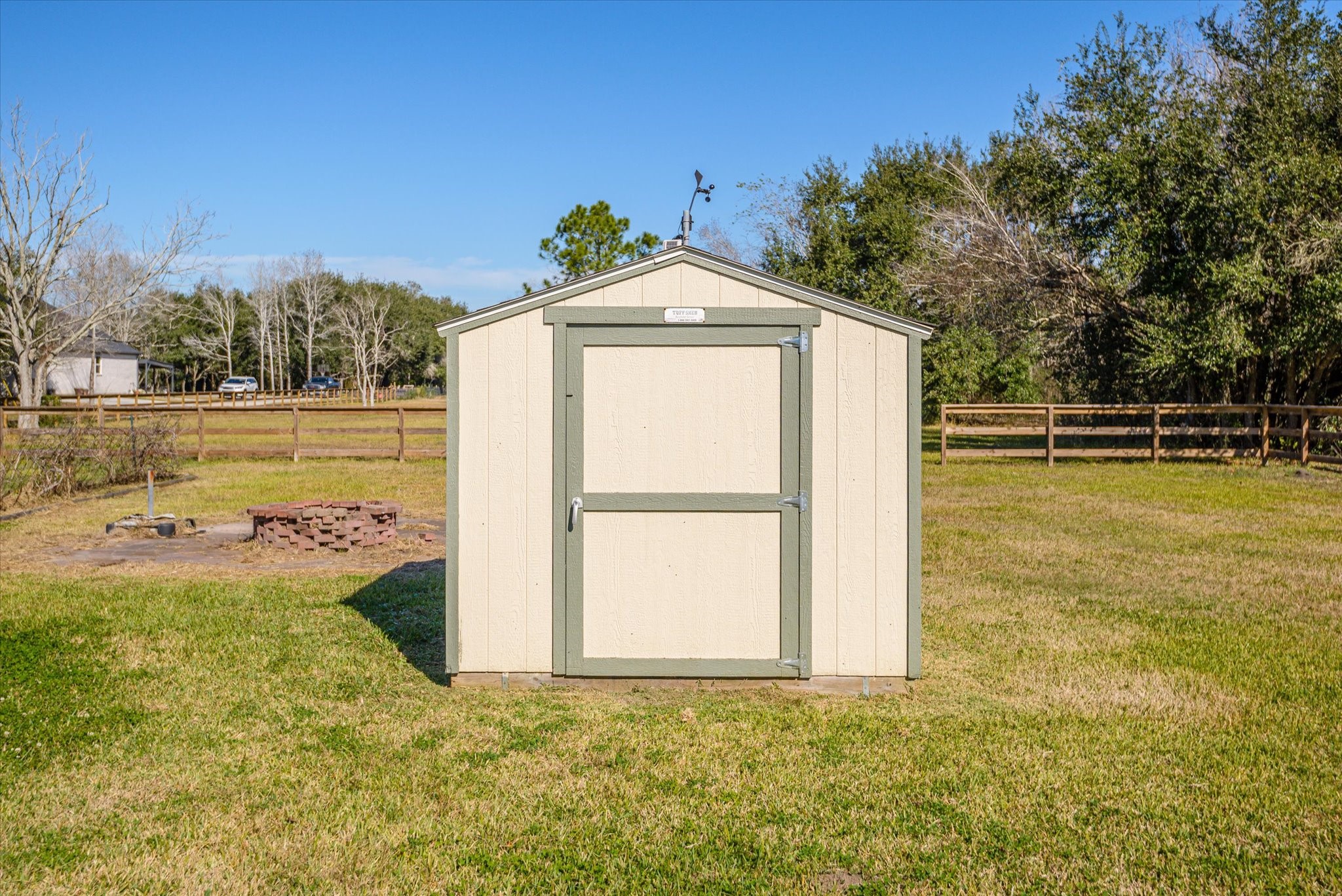 11578 28th Street Santa Fe, TX 77510 - Photo 33 of 46 a view of a house with backyard and trees in the background