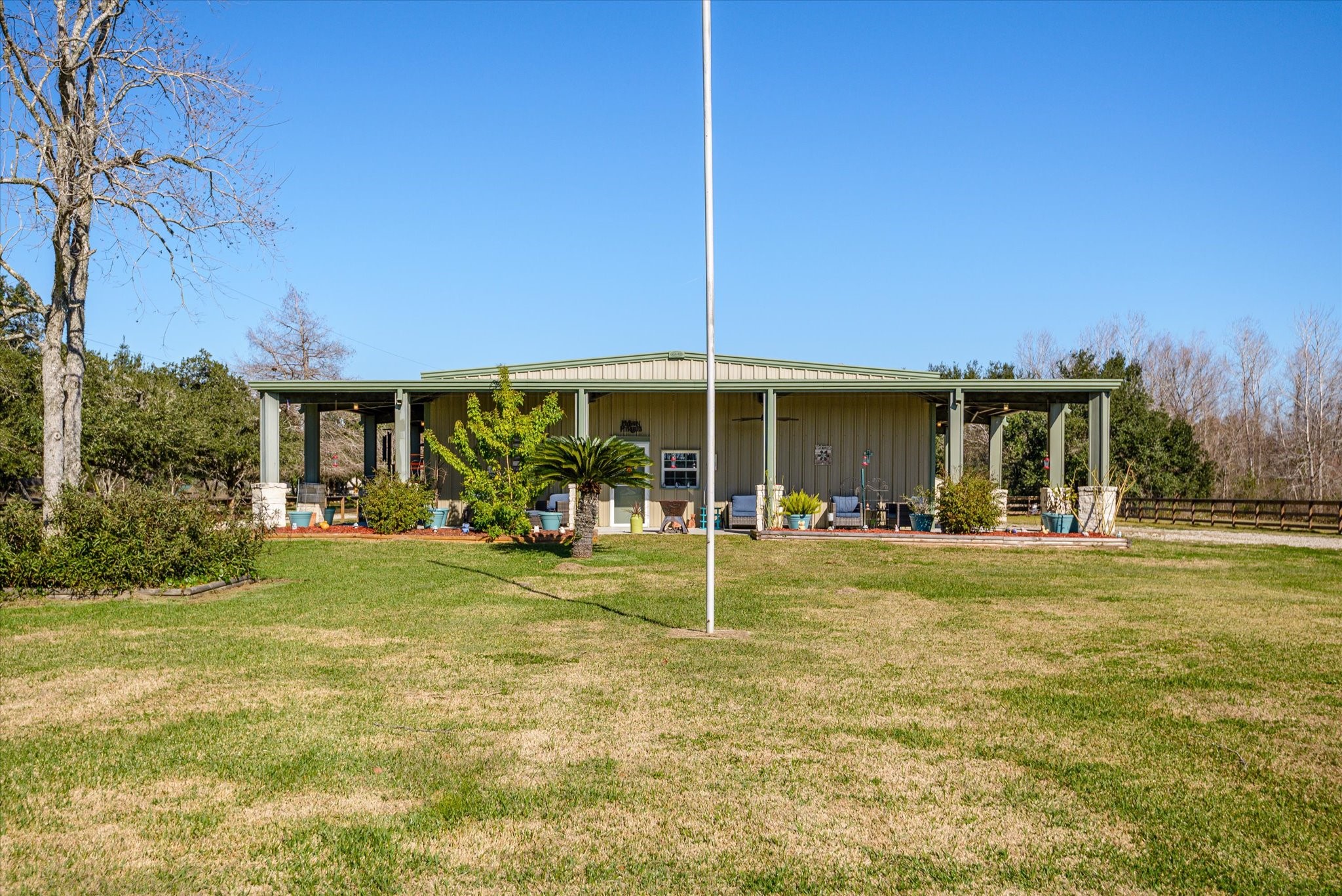 11578 28th Street Santa Fe, TX 77510 - Photo 6 of 46 a view of a house with a yard and sitting area