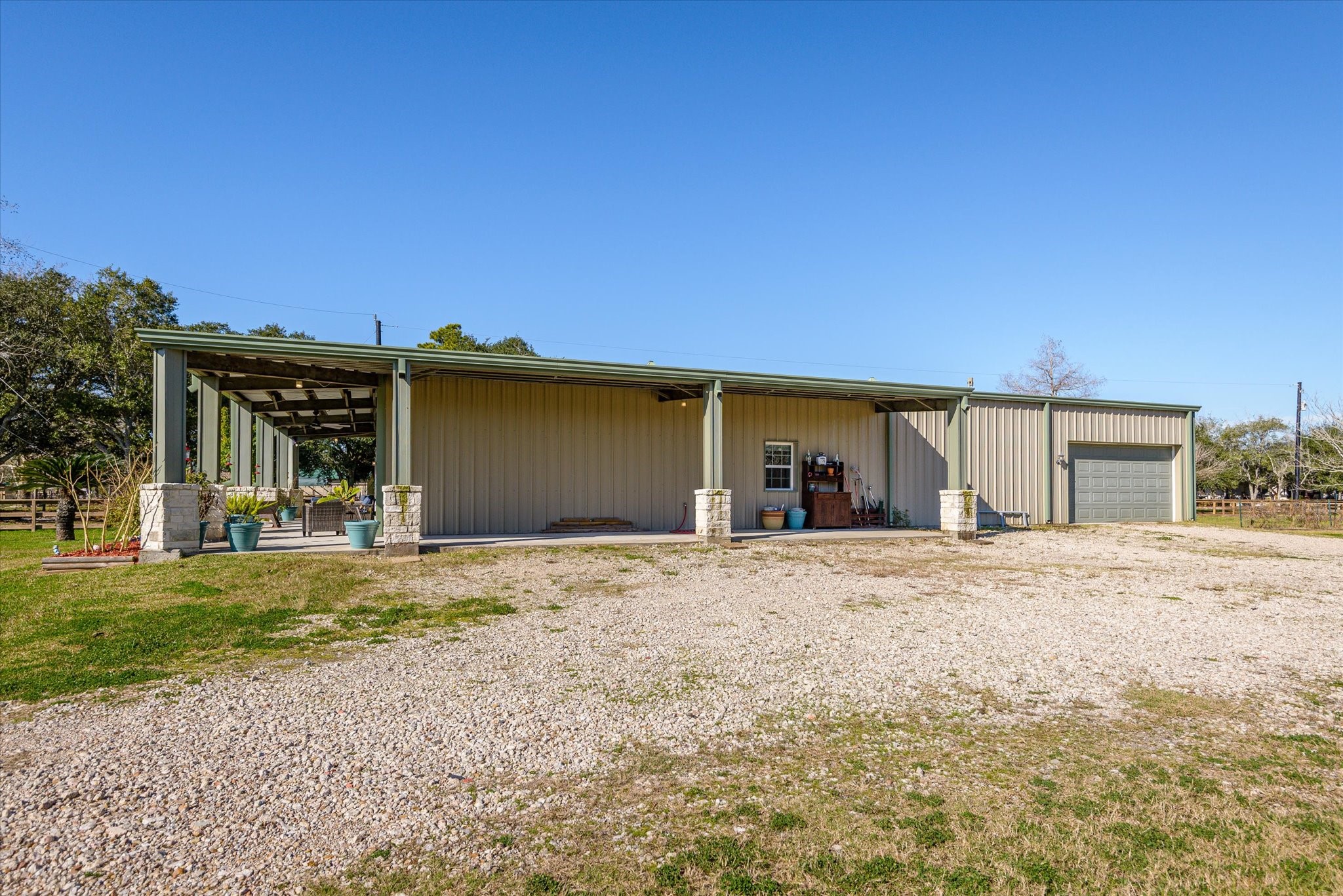 11578 28th Street Santa Fe, TX 77510 - Photo 7 of 46 a front view of a house with a yard and garage