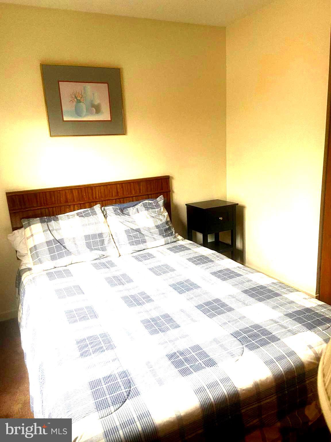 529 King Street Basye, VA 22810 - Photo 27 of 32 a bedroom with a bed and a painting on the wall