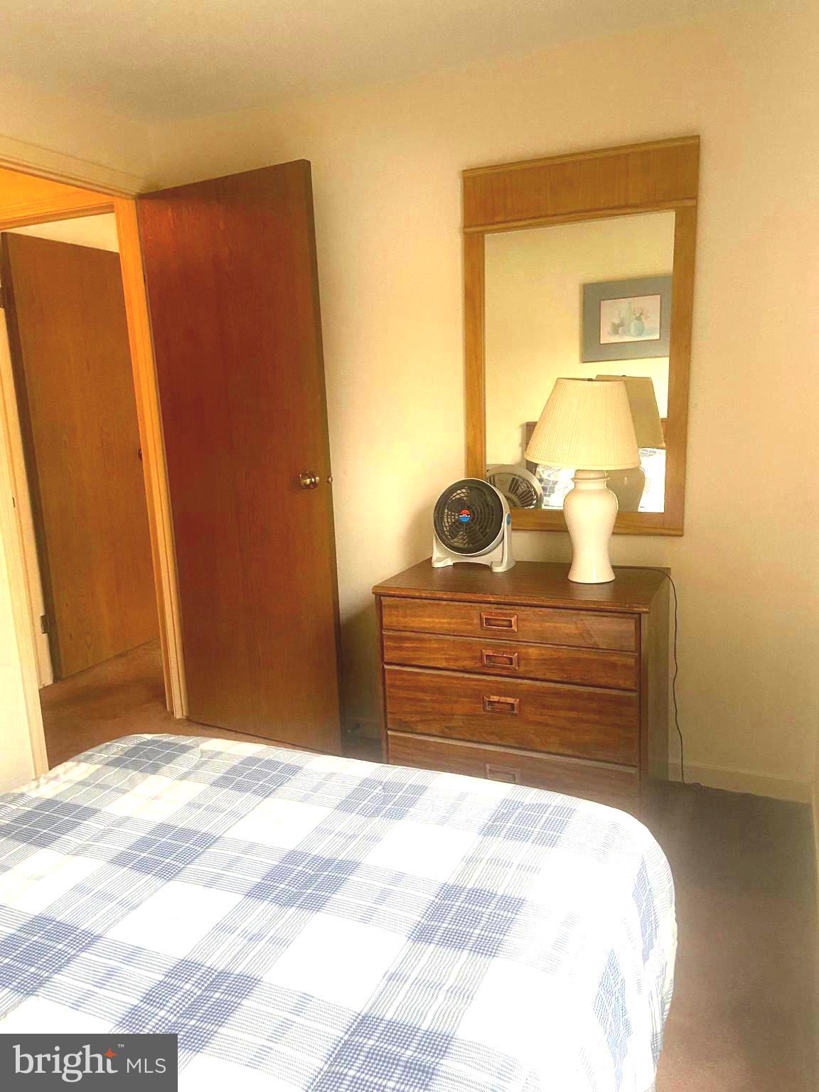 529 King Street Basye, VA 22810 - Photo 29 of 32 a bed room with a bed and dresser