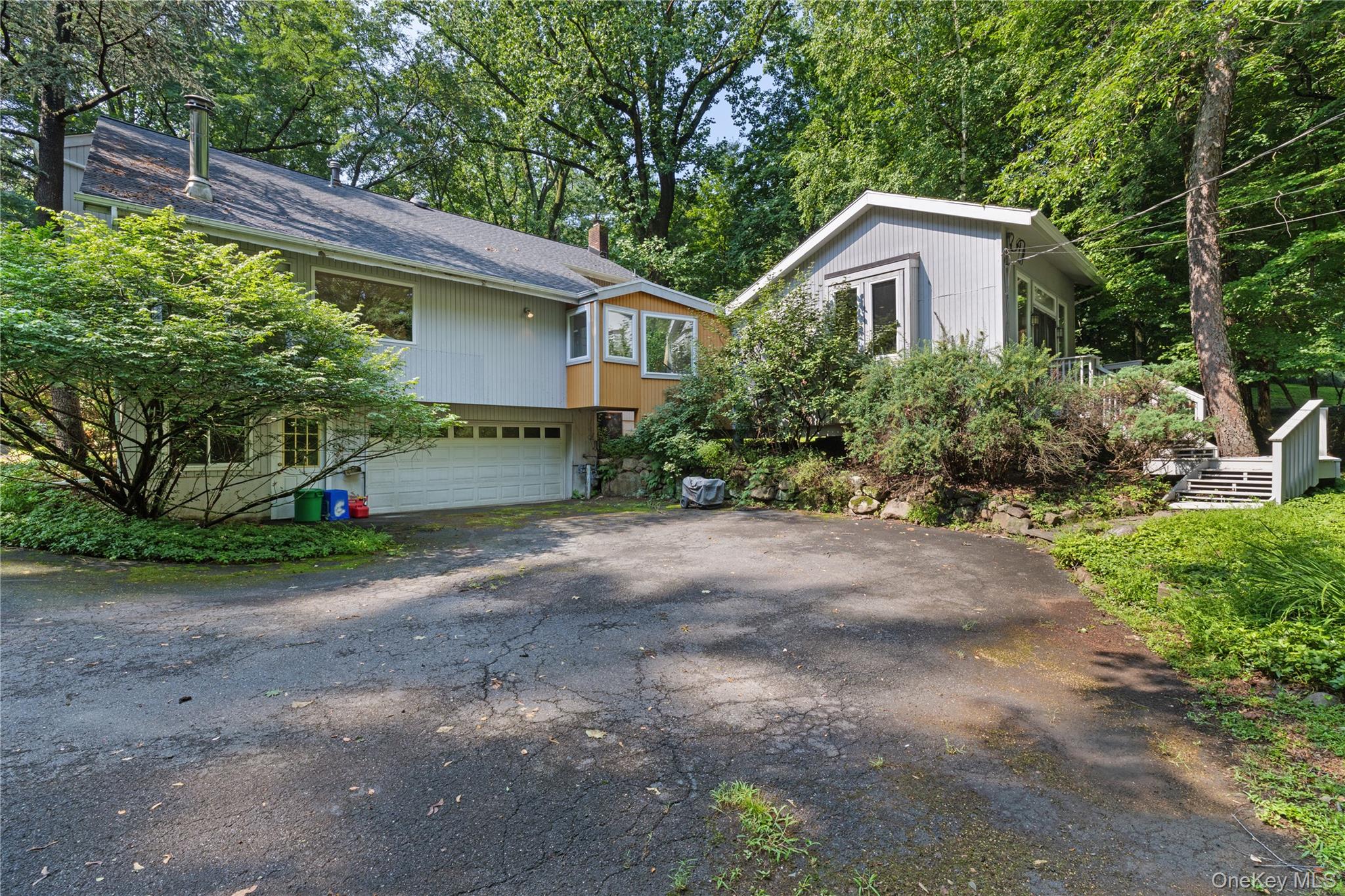 85 Rockland Road Sparkill, NY 10976 - Photo 32 of 42 Driveway to 2-car garage and studio on right with separate entry