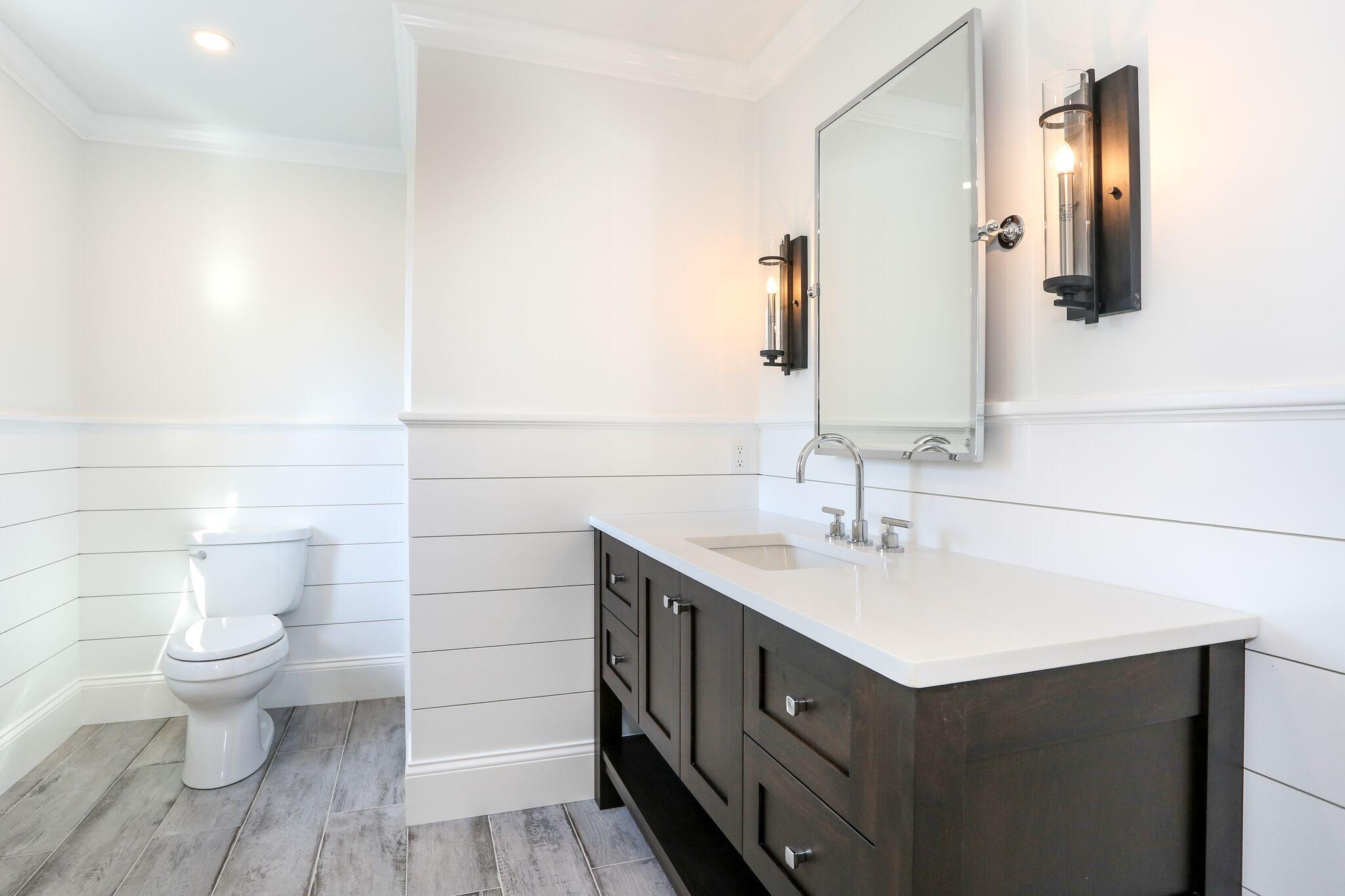 9 Jericho Road Dennis, MA 02638 - Photo 26 of 42 a bathroom with a sink a toilet and mirror