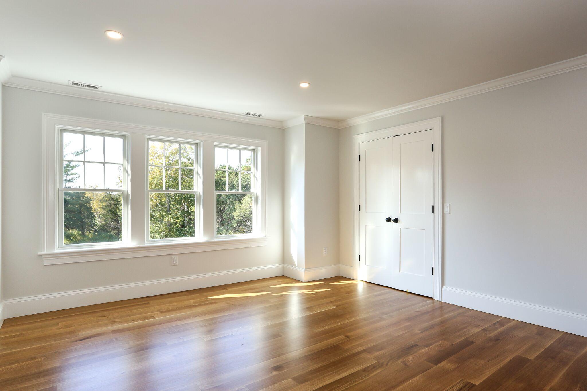 9 Jericho Road Dennis, MA 02638 - Photo 28 of 42 a view of an empty room with wooden floor and a window