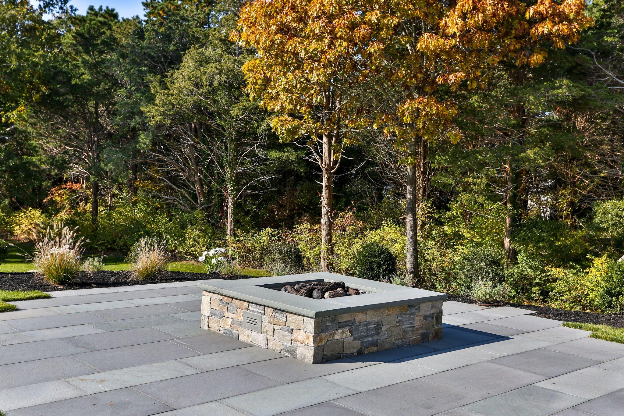 9 Jericho Road Dennis, MA 02638 - Photo 39 of 42 a view of a yard with an outdoor seating