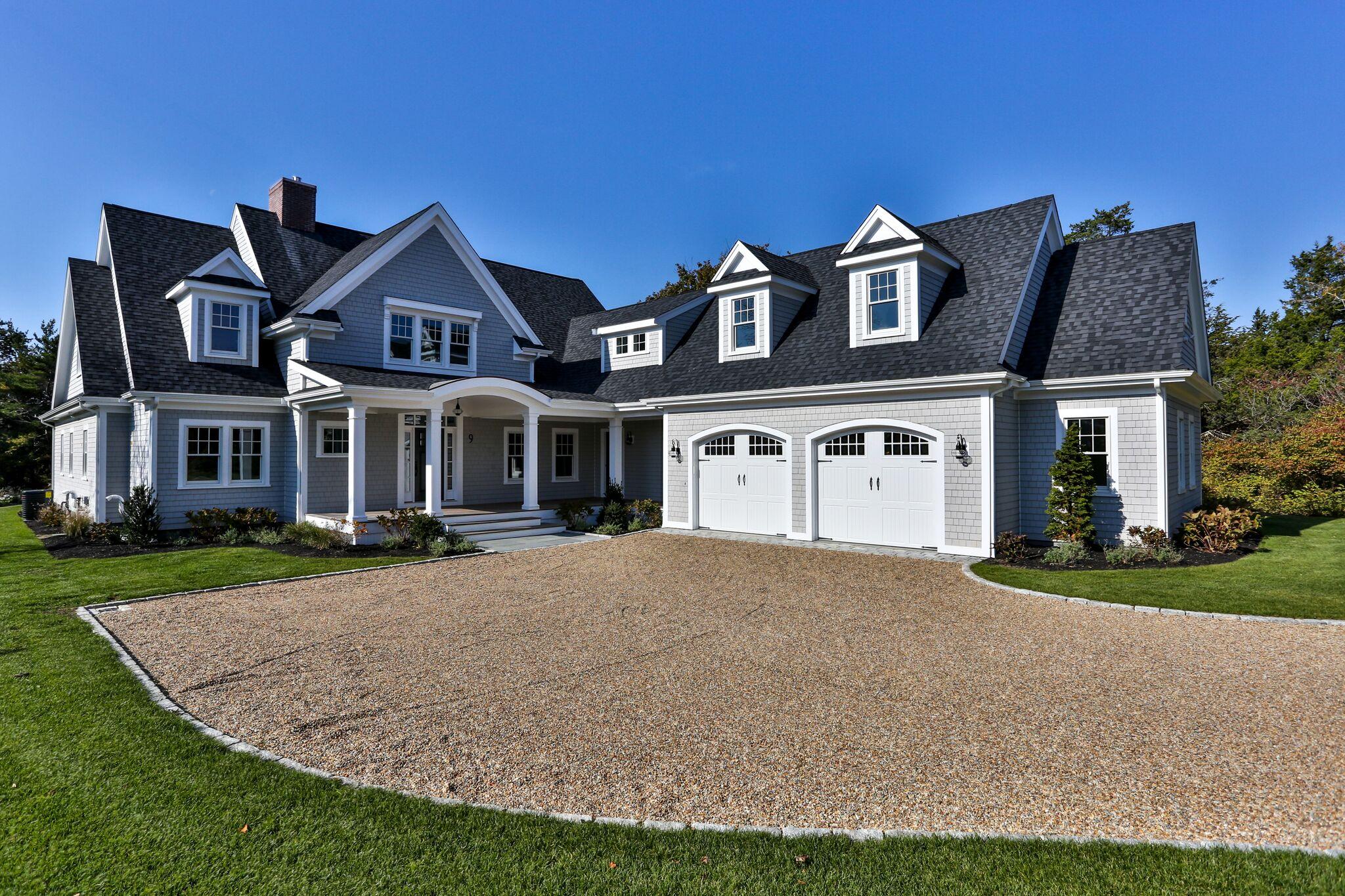 9 Jericho Road Dennis, MA 02638 - Photo 4 of 42 a front view of a house with yard and parking
