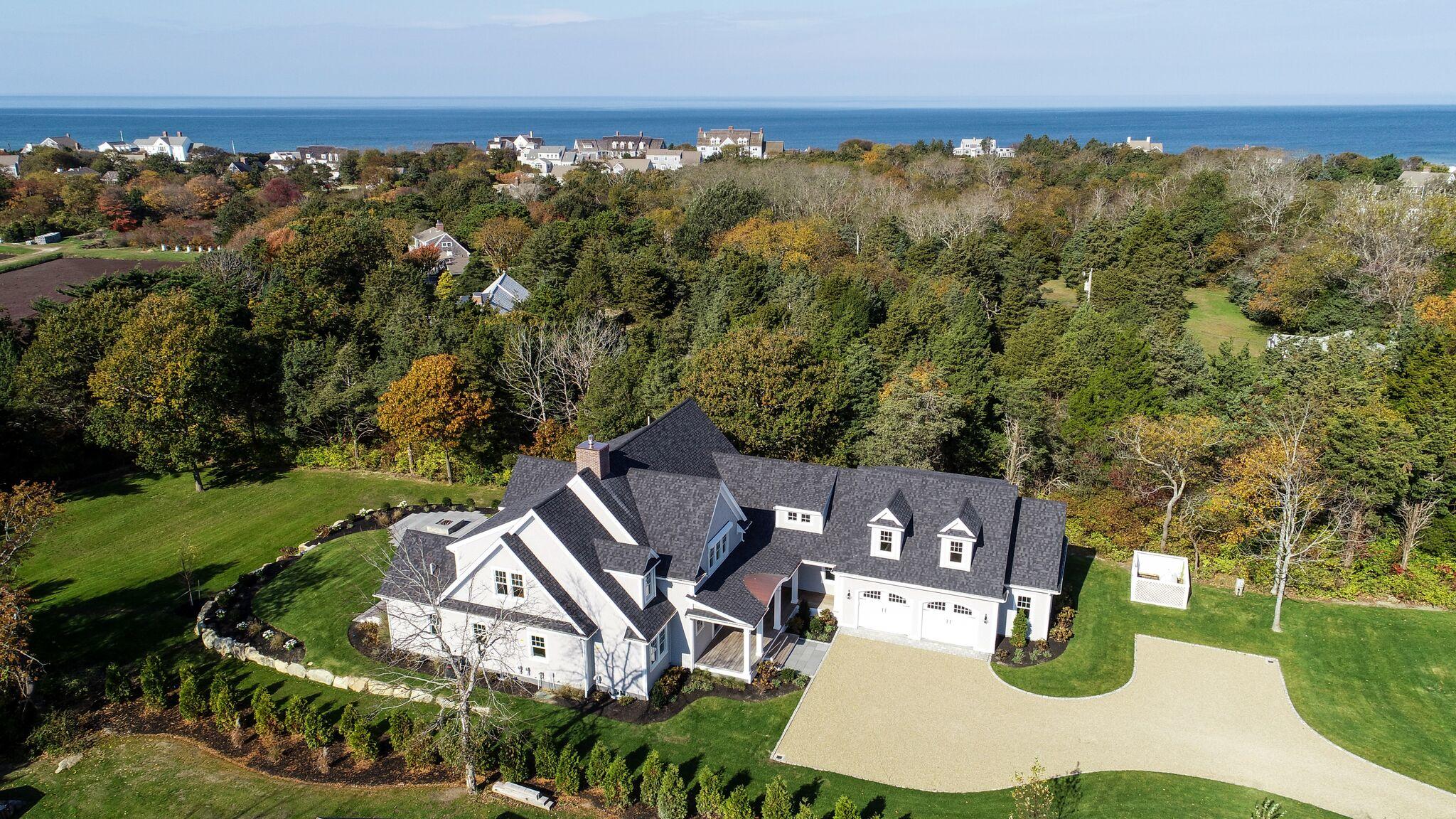 9 Jericho Road Dennis, MA 02638 - Photo 41 of 42 an aerial view of a house with garden space and outdoor seating