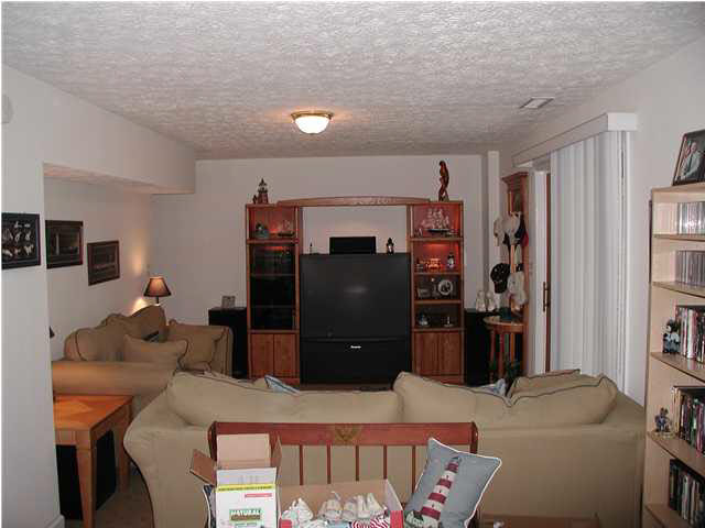 6 Rowell Road Palmyra, VA 22963 - Photo 3 of 5 a living room with furniture and a flat screen tv