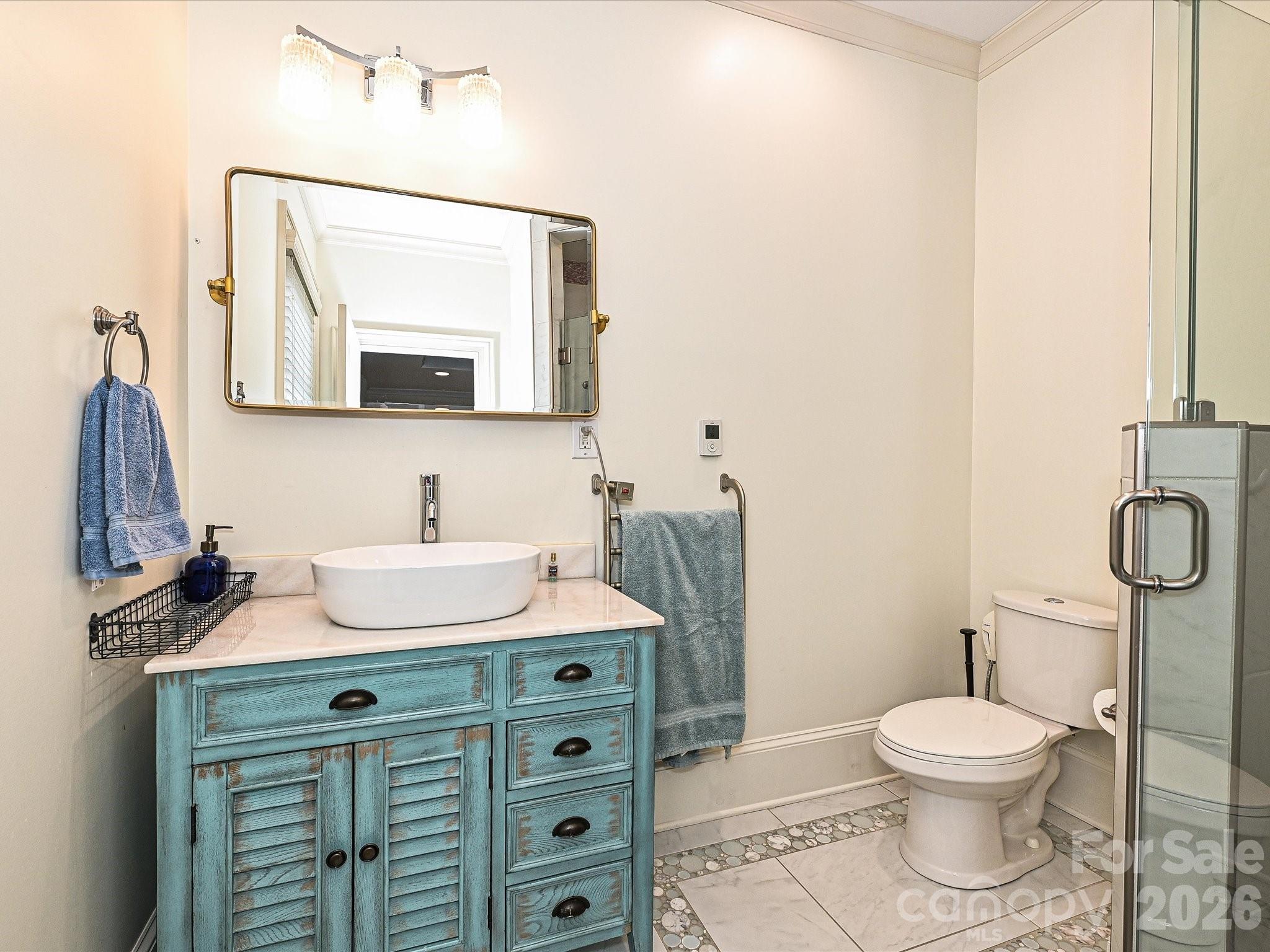 2132 Rolston Drive Charlotte, NC 28207 - Photo 24 of 41 a bathroom with a granite countertop toilet sink and mirror