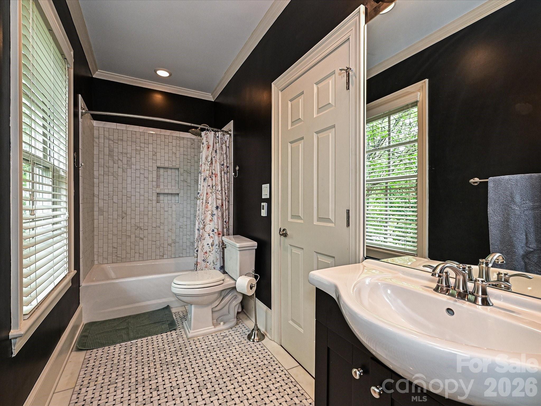 2132 Rolston Drive Charlotte, NC 28207 - Photo 26 of 41 a bathroom with a sink toilet and shower