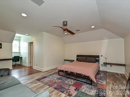 a bathroom with a shower and a sink