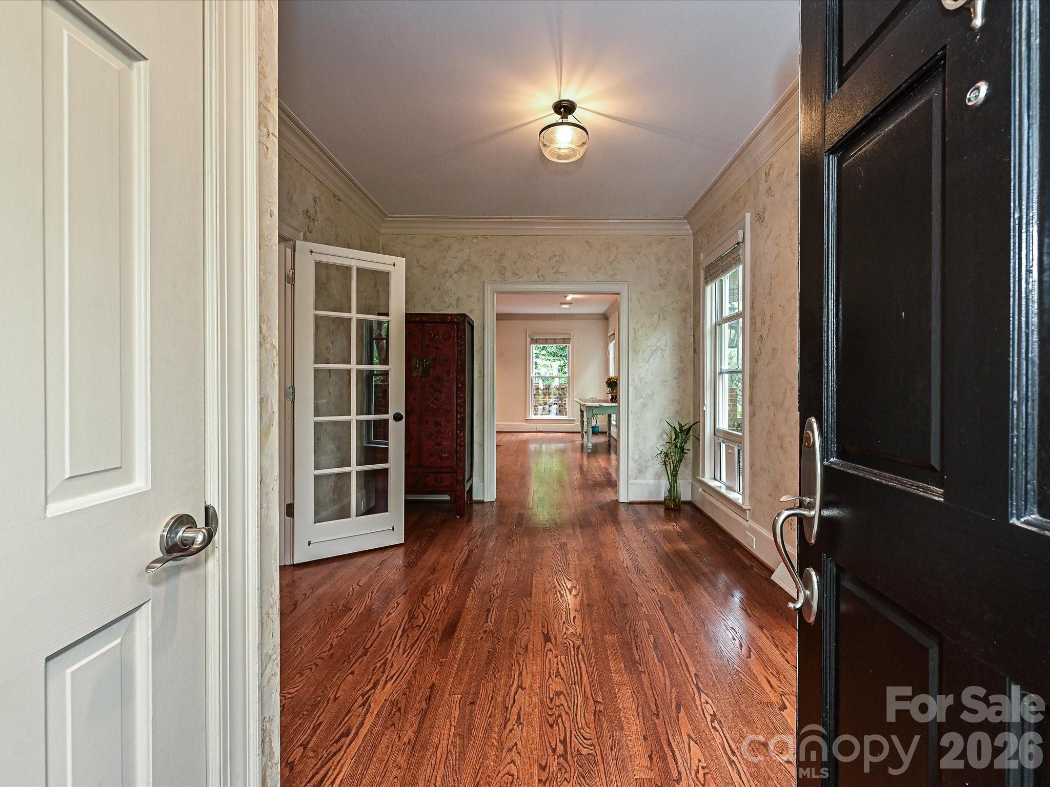 2132 Rolston Drive Charlotte, NC 28207 - Photo 4 of 41 wooden floor in an empty room and a kitchen