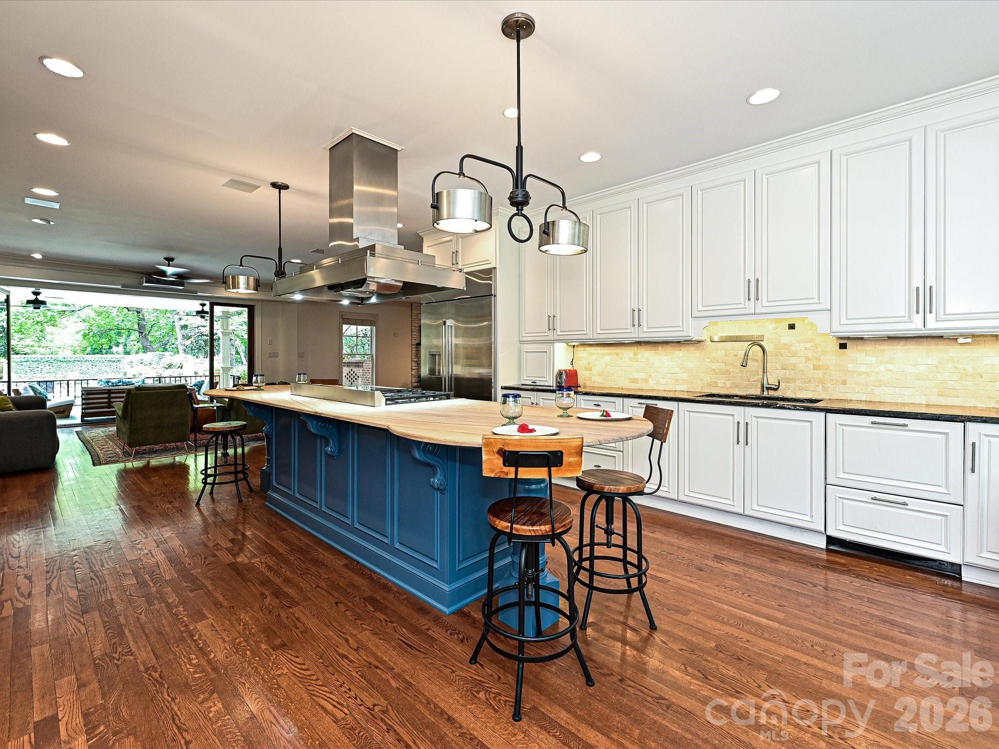 2132 Rolston Drive Charlotte, NC 28207 - Photo 6 of 41 a kitchen with a sink cabinets and wooden floor