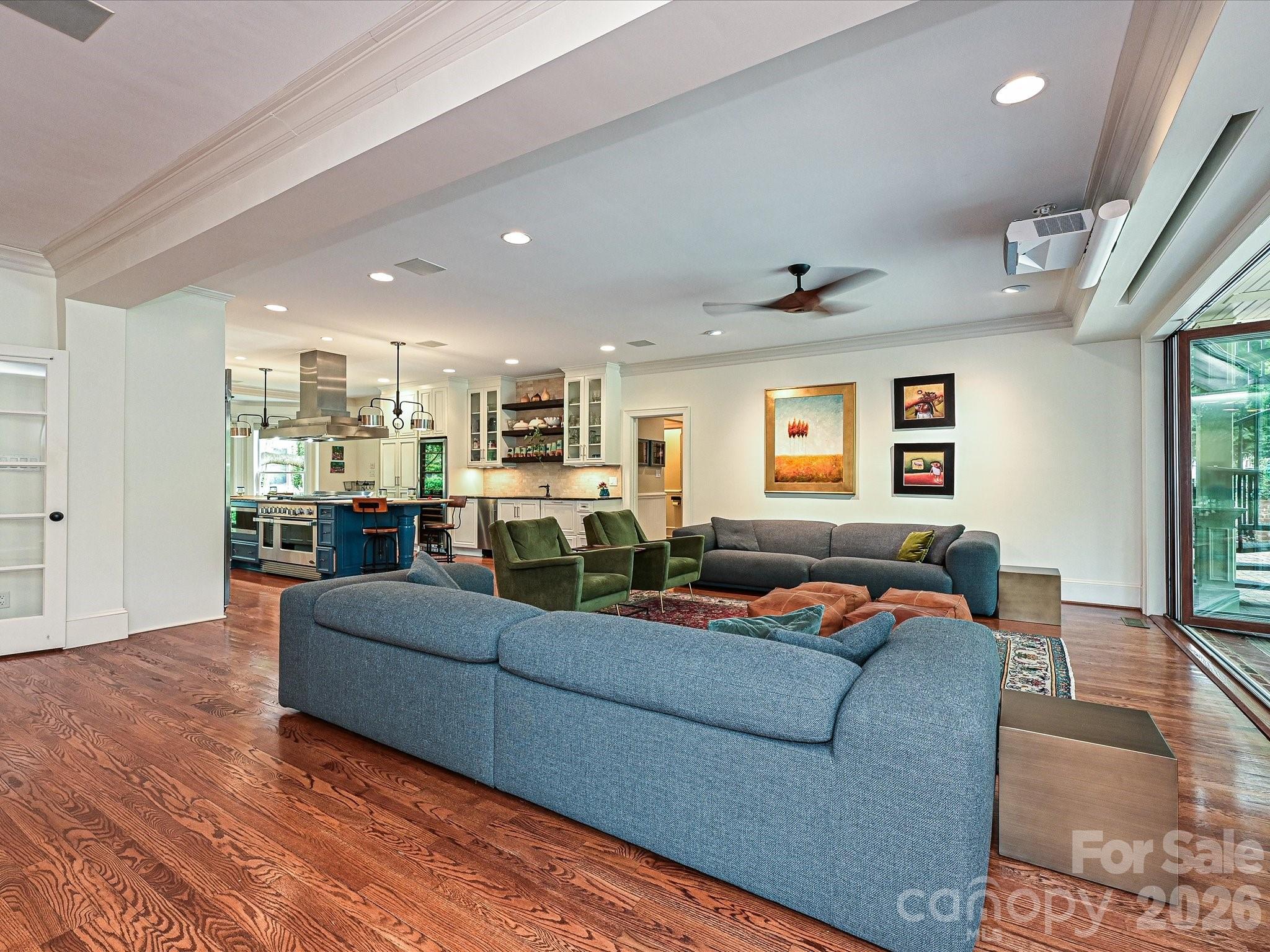 2132 Rolston Drive Charlotte, NC 28207 - Photo 10 of 41 a living room with furniture and a flat screen tv