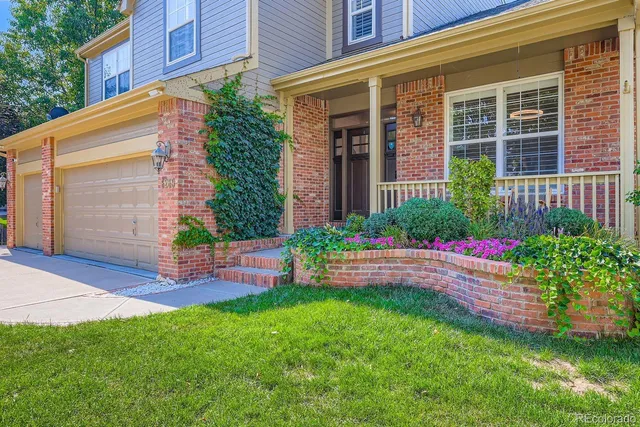 a house view with a garden space