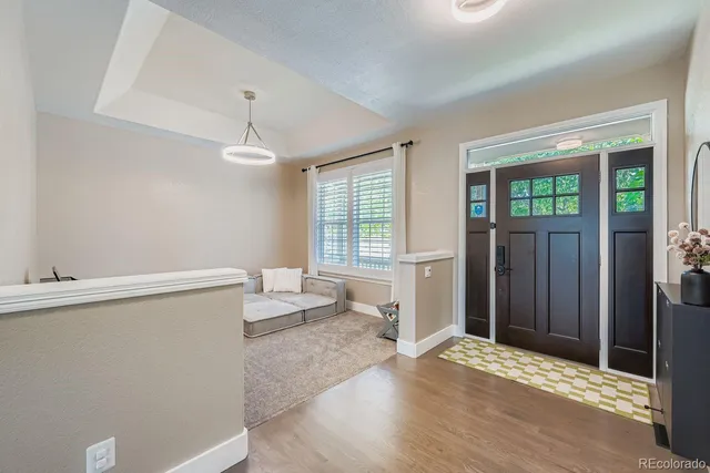 a living room with furniture and window