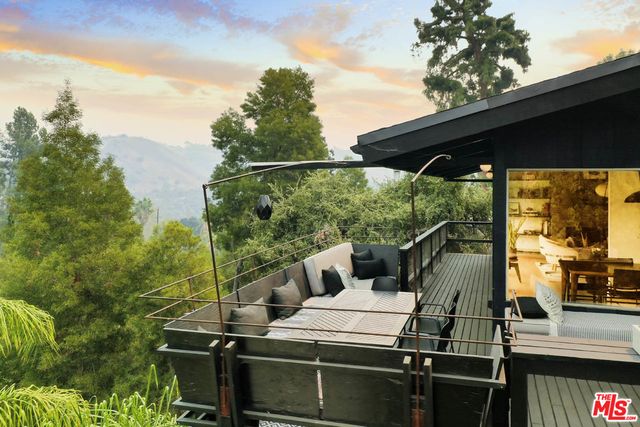 a view of a living room and bathroom