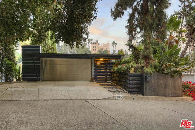 a black and white photo of a living room