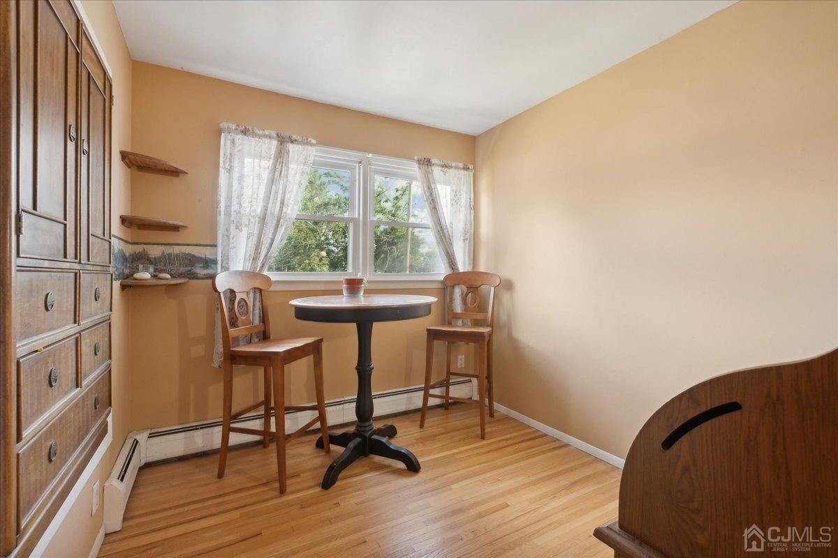 15 Weiss Drive Middlesex, NJ 08846 - Photo 14 of 33 a view of a workspace with furniture and a window
