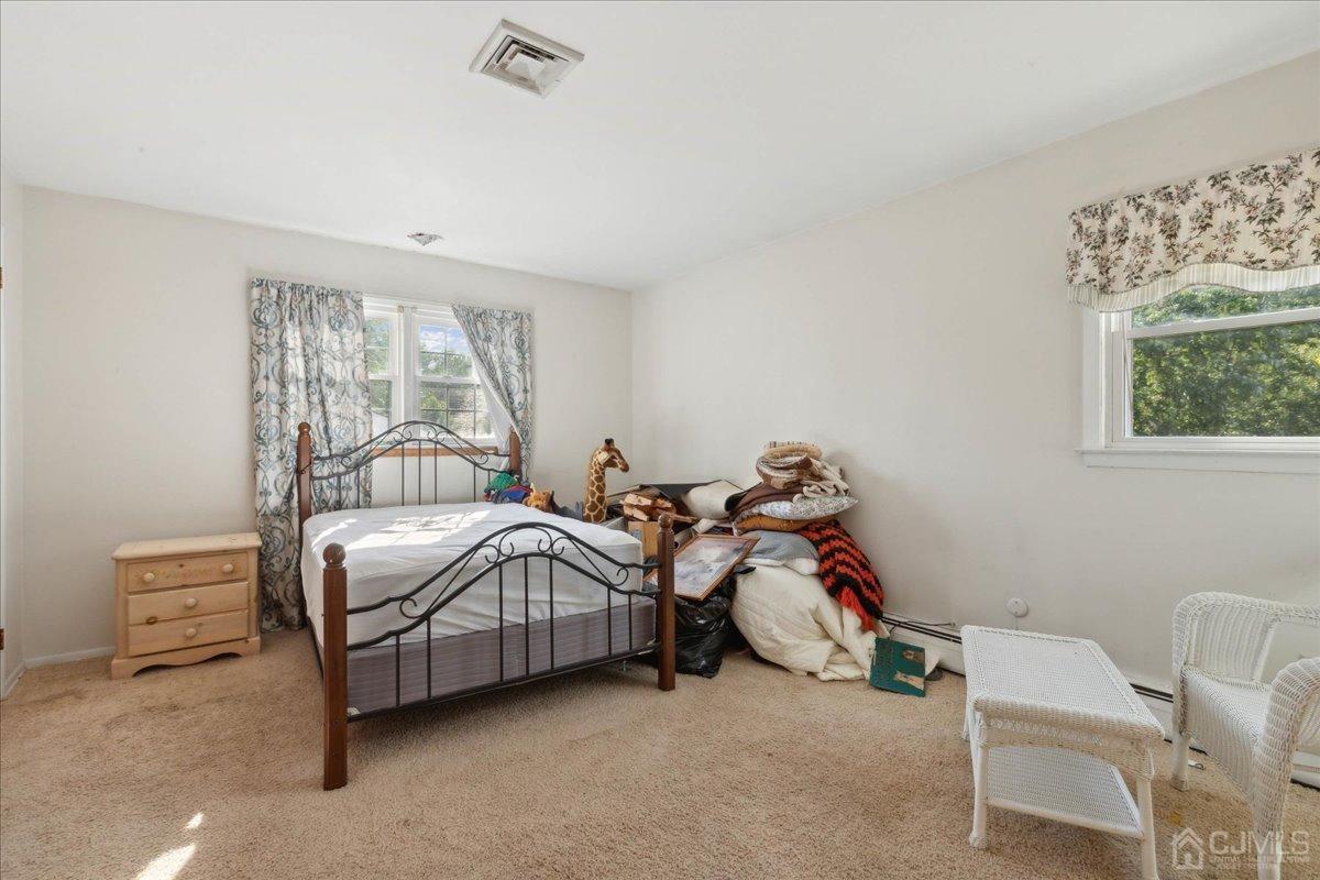 15 Weiss Drive Middlesex, NJ 08846 - Photo 15 of 33 a bedroom with bed and a window