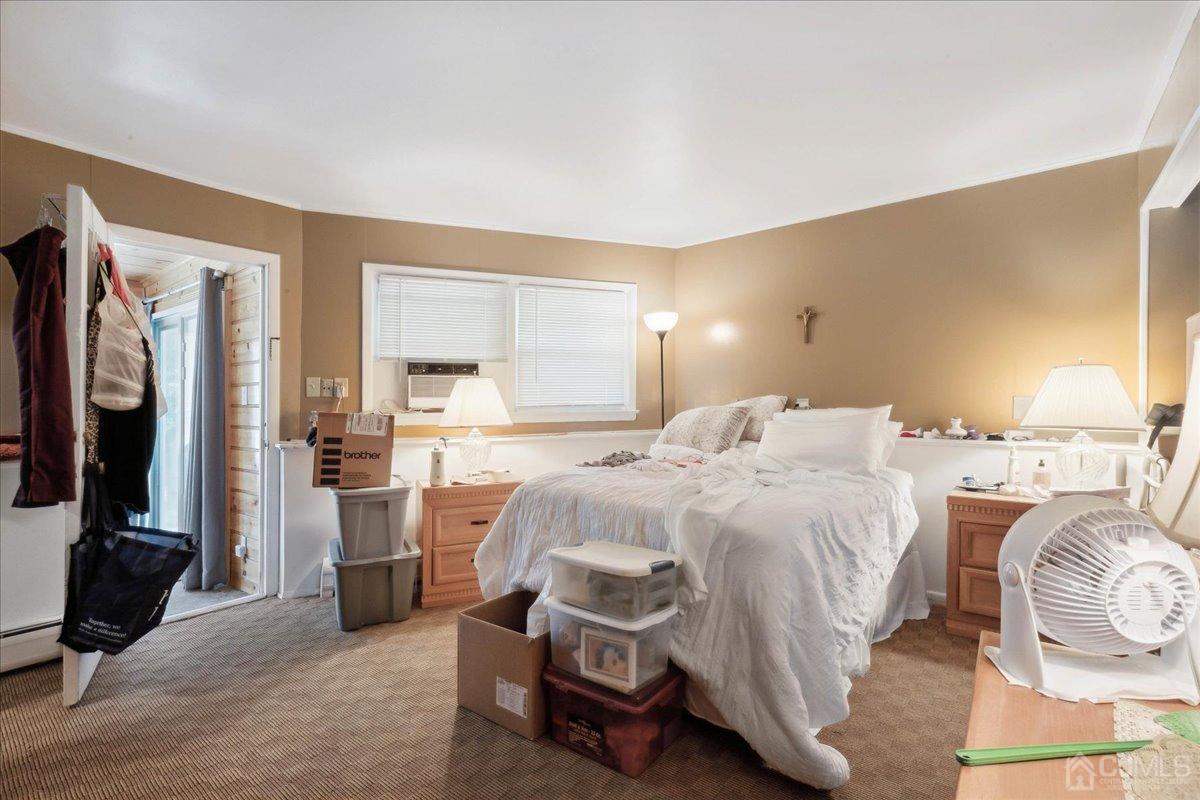 15 Weiss Drive Middlesex, NJ 08846 - Photo 19 of 33 a bedroom with a bed and a mirror