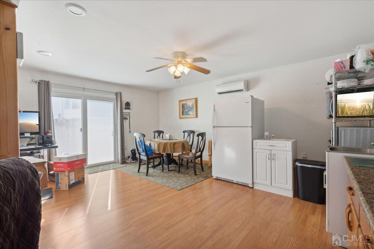 15 Weiss Drive Middlesex, NJ 08846 - Photo 22 of 33 a dining room with furniture and chandelier kitchen view