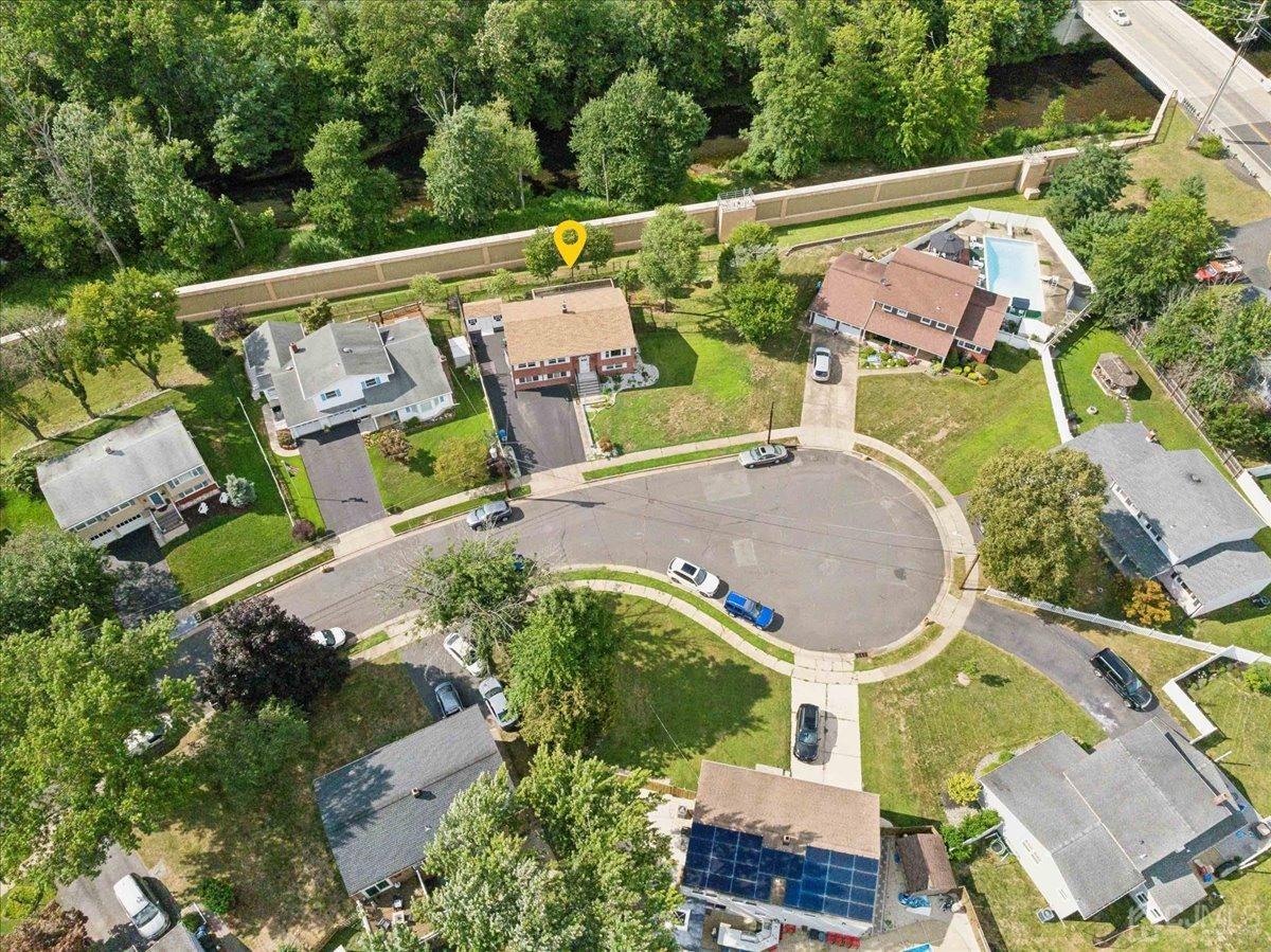 15 Weiss Drive Middlesex, NJ 08846 - Photo 28 of 33 an aerial view of a house with a garden and lake view