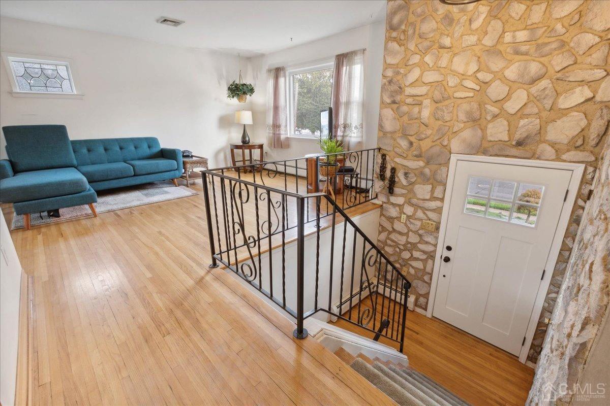 15 Weiss Drive Middlesex, NJ 08846 - Photo 4 of 33 a view of livingroom with furniture and windows