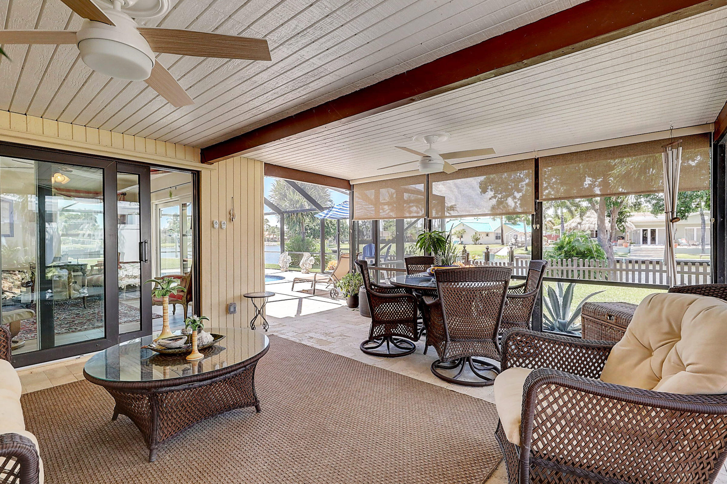 614 Eagle Drive Delray Beach, FL 33444 - Photo 25 of 30 Florida Room Leading to Pool Deck