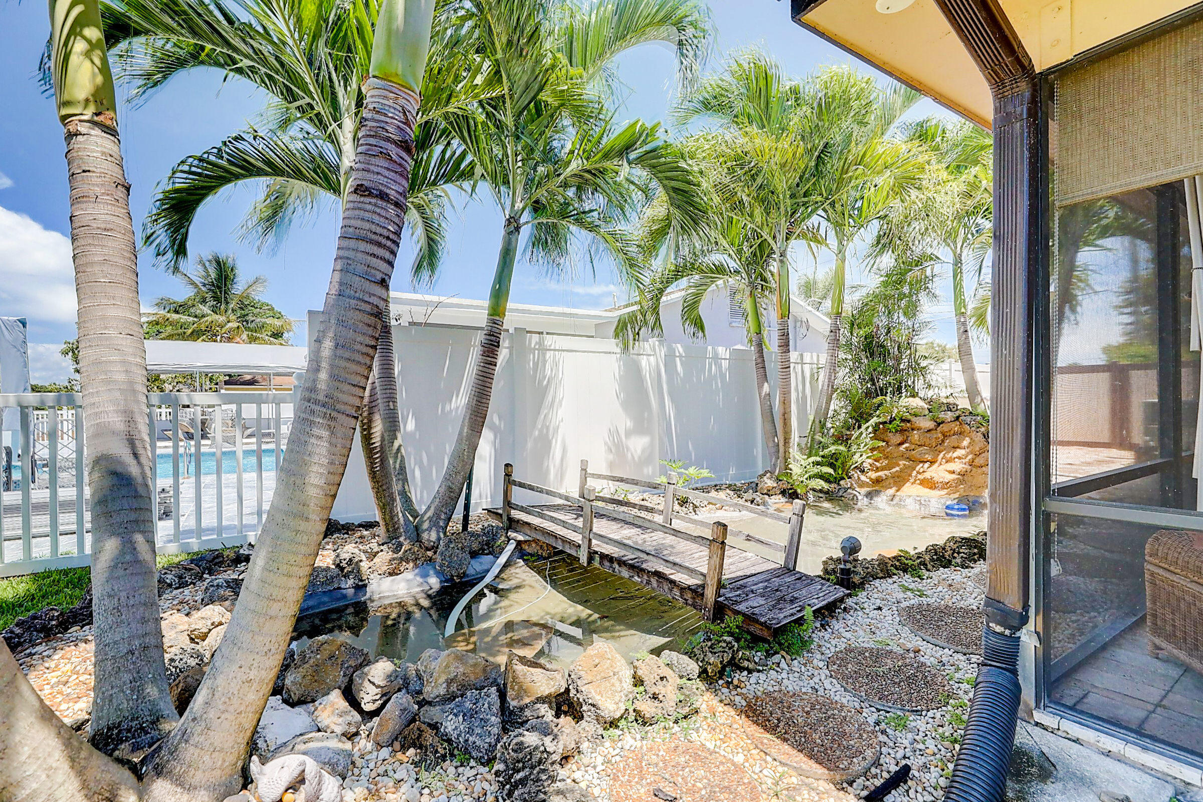 614 Eagle Drive Delray Beach, FL 33444 - Photo 26 of 30 Pond and Waterfall