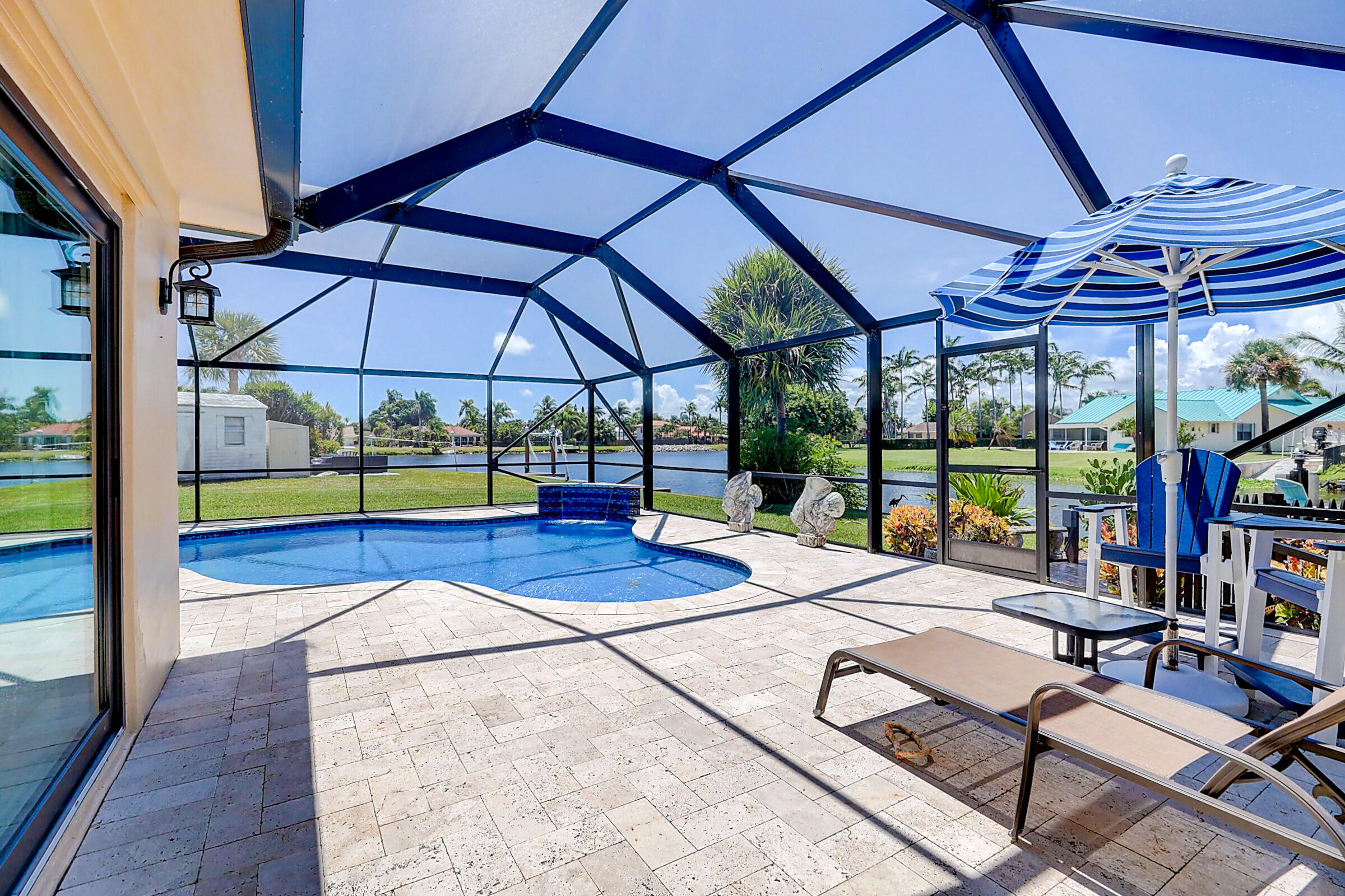 614 Eagle Drive Delray Beach, FL 33444 - Photo 6 of 30 Pool Deck with View of Waterway